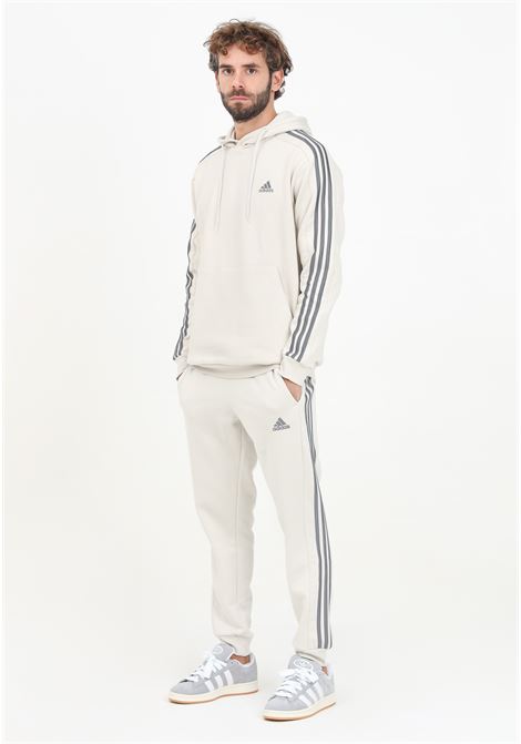 Pantalone sportivo Essentials French Terry Tapered Cuff 3-Stripes beige da uomo ADIDAS PERFORMANCE | JG5952.